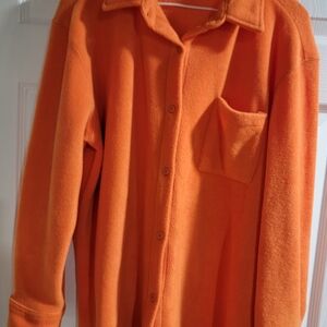 Comfy orange fleece button-up shirt. Passports brand. Size M
